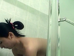 Alluring Korean babe shows her shower solo