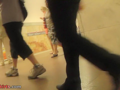 Amateur auburn girl shows g-string in candid upskirts