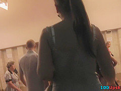Amateur brunette shows off lingerie in candid upskirts