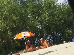 Amateur milfs on a hidden nudist beach cam