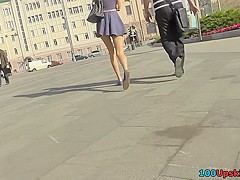 Amateur redhead shows sexy legs in candid upskirts