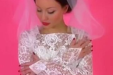 An Erotic Tease 001-A Brunette Hair Bride Undresses Out of Her Suit