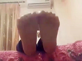 Angela moves her sexy size 39 feet