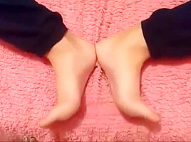 Angela moves her sexy size 39 feet