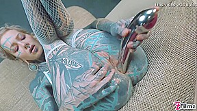 Anuskatzz Shoves A Stainless Steel Dildo Up Her Ass