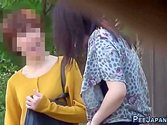 Asian Lady Pisses Herself