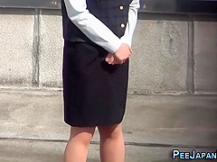 Asian Lady Pisses Herself