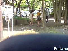 Asian Lady Pisses Herself