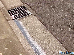 Asian Lady Pisses Herself