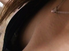 Asian cutie treats us to a down blouse view of her perky tits
