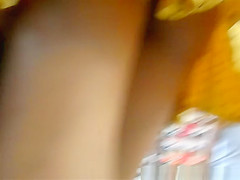 Asian yellow dress upskirted