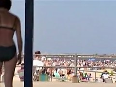 Babe fixing her candid bikini panty on the firm ass 04v