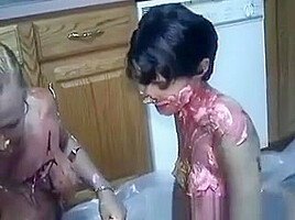 Babes Kiss With Food In Mouth