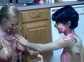 Babes Kiss With Food In Mouth