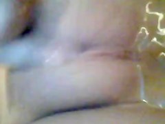 Bald and tight pussy getting rubbed in the bathtub