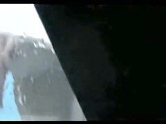 Beach change cabin voyeuring for the small titted babe