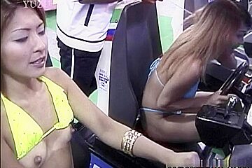 Beautiful Asian babes in bikini give a double blowjob in a public place!