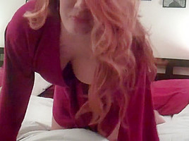 Bedtime striptease with a redhead