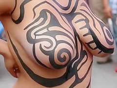 Big tits girl public body painting
