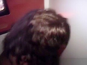 Black Amateur On Her Knees Sucking Dick Through Glory Hole