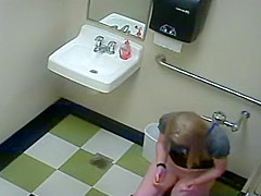 Blonde girl in pees in a public toilet