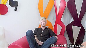 Blonde guy having bareback interracial gay sex