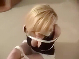 Booted blonde roped and microfoam gagged