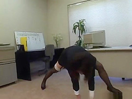 Bored secretary exercises while teasing at the same time by licki