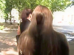Brunette sucking outdoor in public