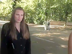 Brunette sucking outdoor in public