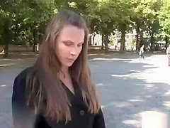 Brunette sucking outdoor in public
