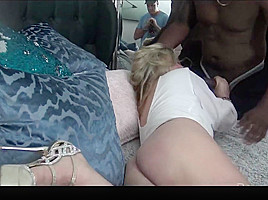 Busty MILF sucking and fucking a huge black cock