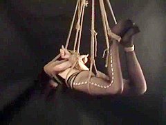 Chinese Girl In Metal And Rope