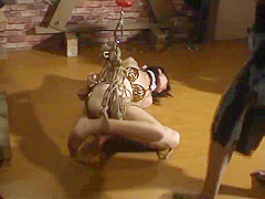 Chinese Girl In Metal And Rope