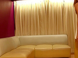 Chubby Ladyboy in White Dress Gets Fucked on the Sofa by a Dude