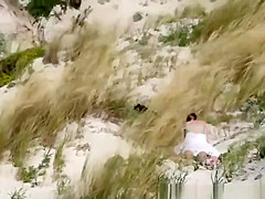 Couple caught fucking in the beach dunes