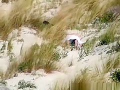 Couple caught fucking in the beach dunes