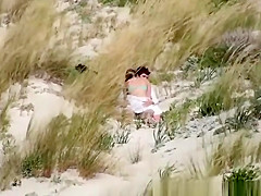 Couple caught fucking in the beach dunes