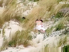 Couple caught fucking in the beach dunes