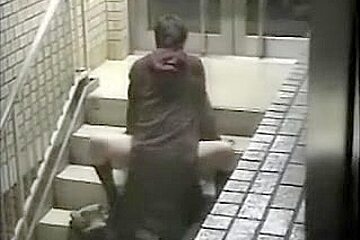 Couple fucks hard on the stairs