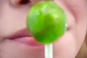 Cute Blonde Sucking 2 Lollipops And Gets Cum On Face