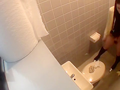 Cute Japanese Peeing Herself in the Bathroom