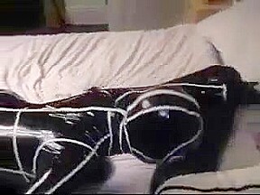 Cute college girl making out in latex catsuits