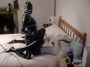 Cute college girl making out in latex catsuits