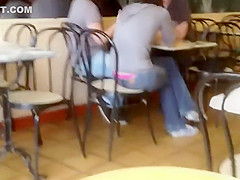 Cute girl's thong is out at a coffee place