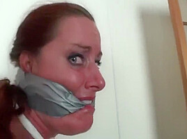 Ducttape gagged and struggling