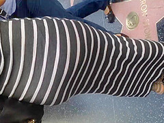 Fat ass Columbian in gray dress