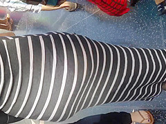 Fat ass Columbian in gray dress