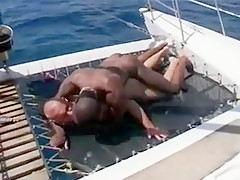 Franco Cento and Sandro on a boat