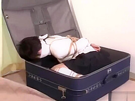 Girl Bound and Gagged in Suitcase